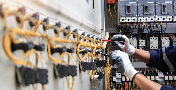 Professional Electrician technician working in Flagler Estates, FL